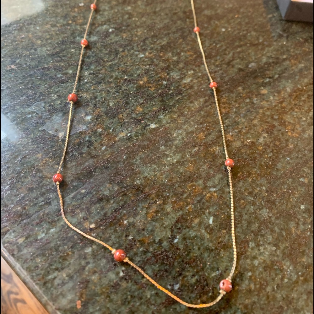 Necklace with orange beads